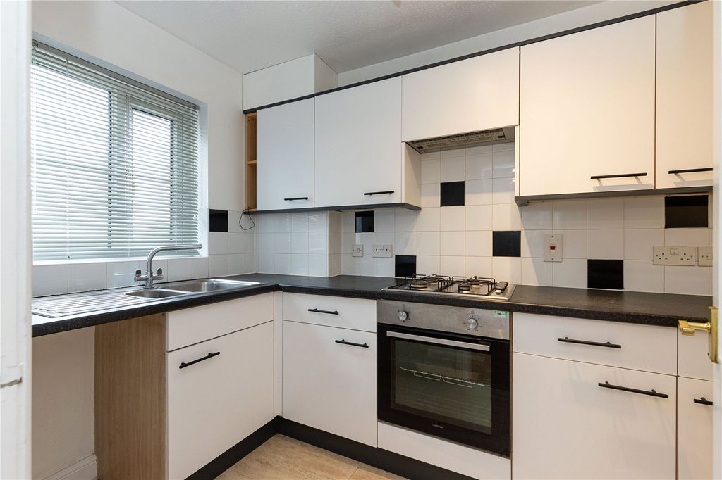 Property photo 3 of 12 Kitchen