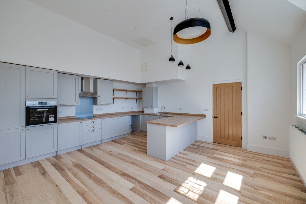 Property photo 2 of 11 Kitchen Living