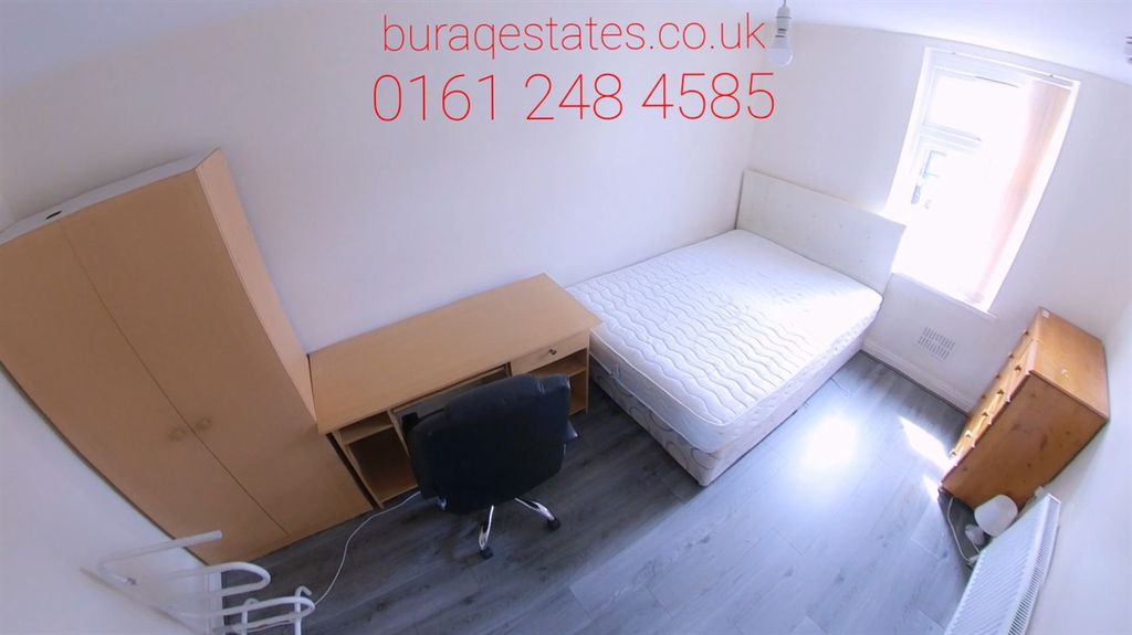 Property photo 3 of 11 A Bright And Tidy Bedroom Featuring A Comfortable ...