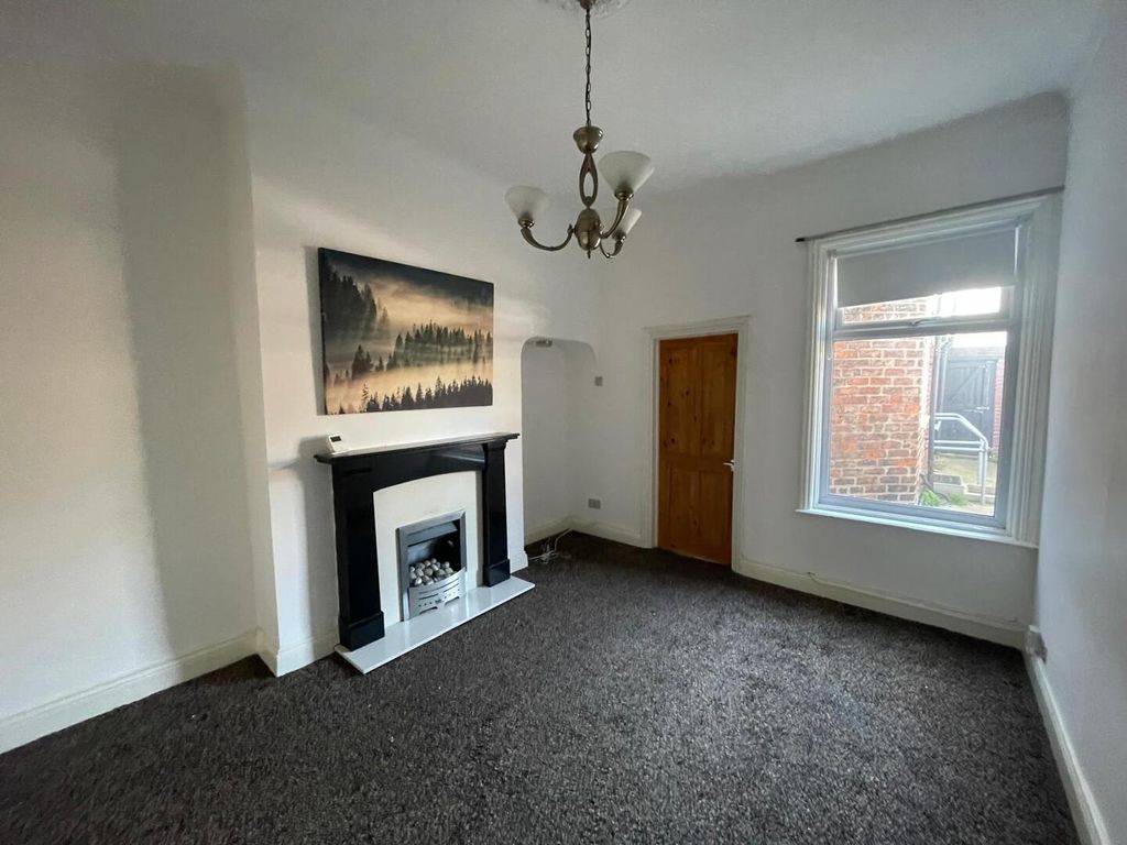 Property photo 2 of 12 Living Room