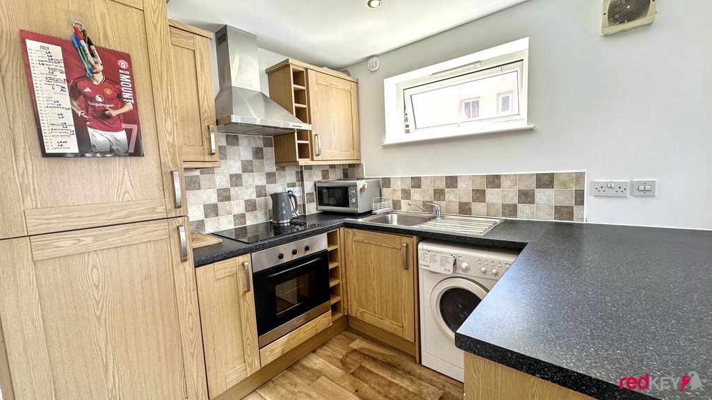 Property photo 3 of 6 Kitchen