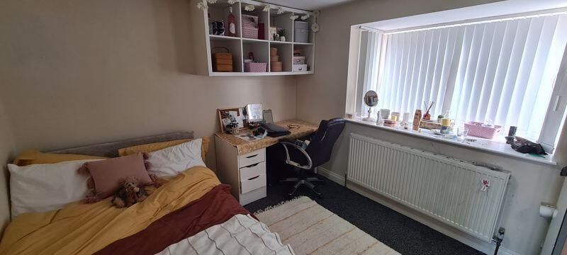 Property photo 2 of 10 A Cozy Bedroom With A Neatly Made Bed, A Window Al...