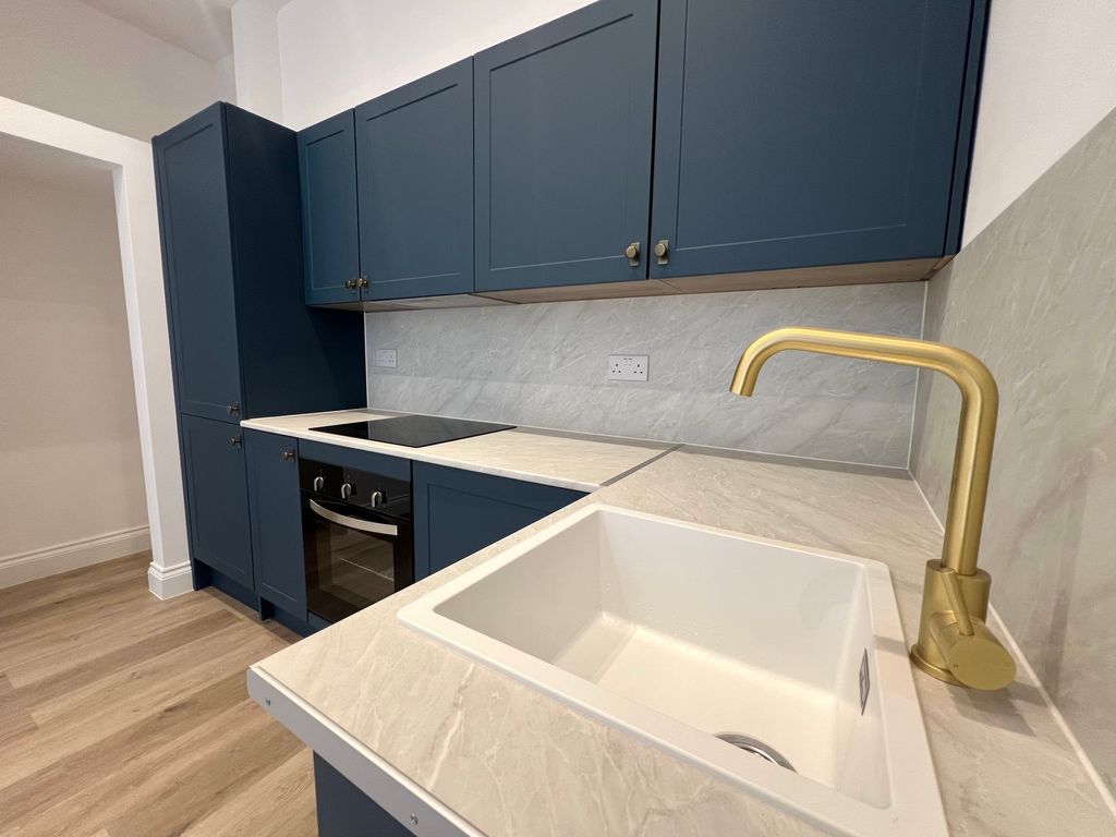 Property photo 1 of 6 Kitchen