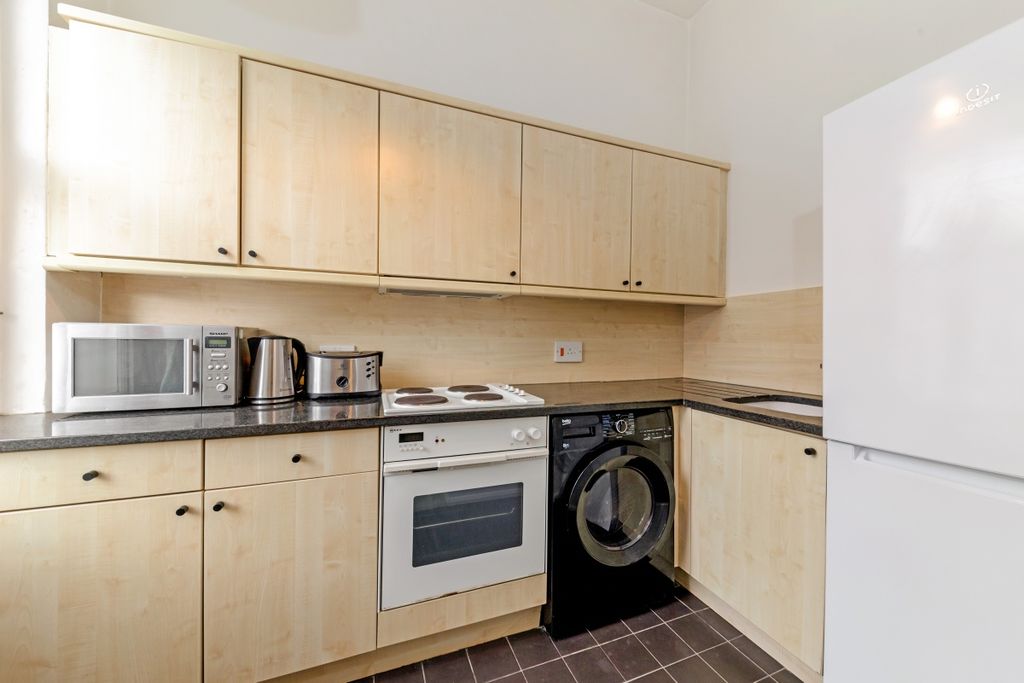 Property photo 3 of 7 Kitchen