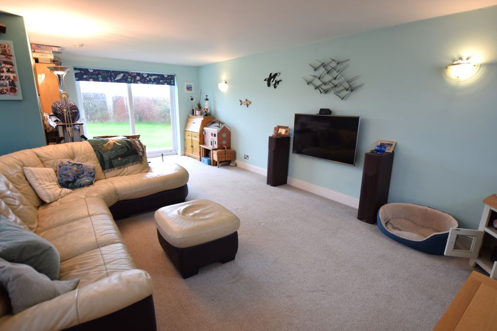 Property photo 3 of 19 Living Area