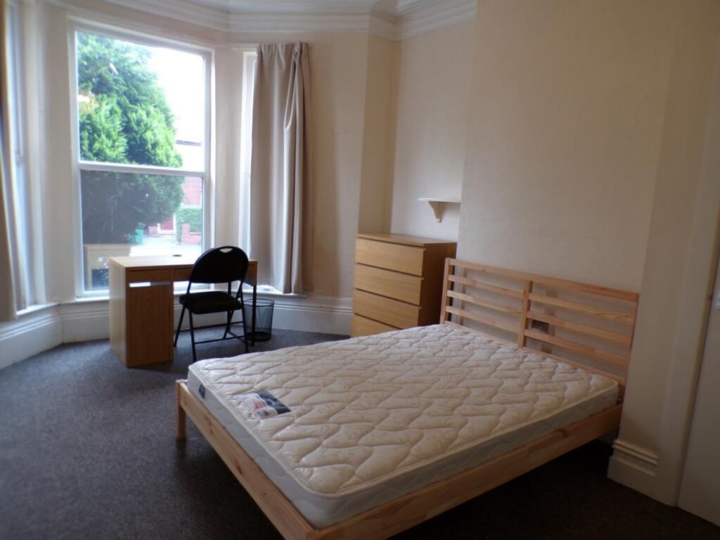 Property photo 2 of 9 Spacious Double Bedroom Featuring Large Windows Th...