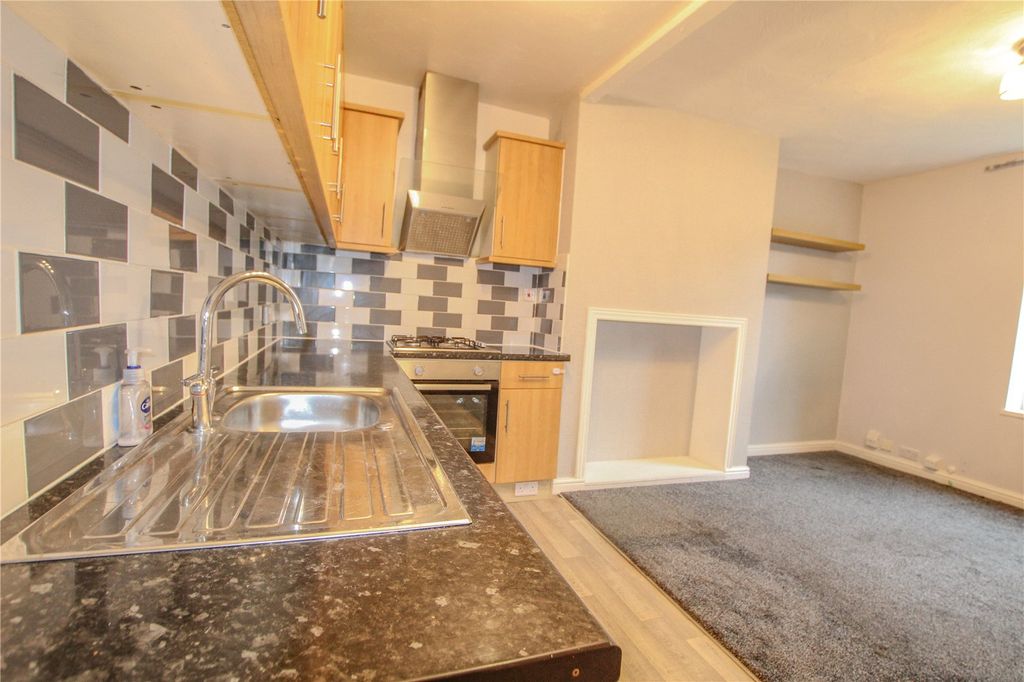 Property photo 3 of 18 Kitchen Area