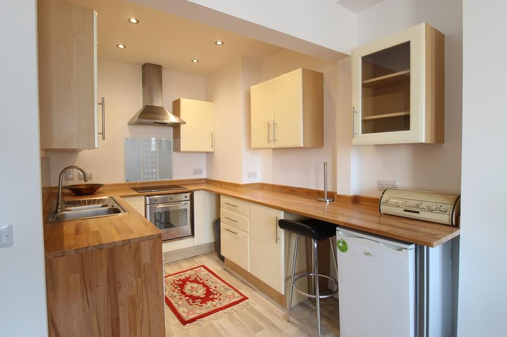 Property photo 3 of 8 Kitchen