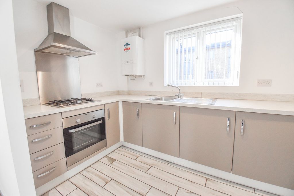 Property photo 1 of 12 Kitchen Area