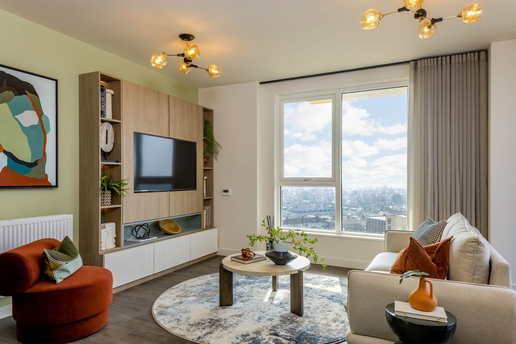 Property photo 1 of 6 Living Area Photo - Fenton Apartments
