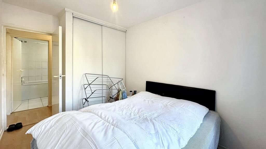 Property photo 2 of 6 Bright, Simply Furnished Bedroom With A Comfortabl...