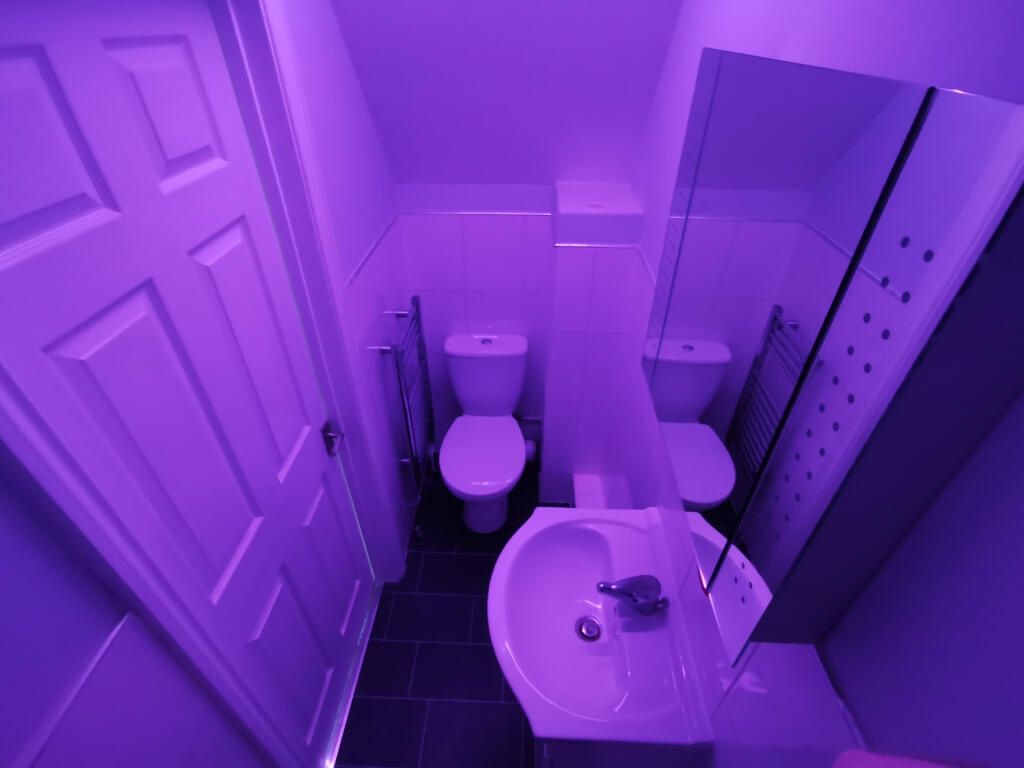 Property photo 3 of 8 Modern Bathroom With Atmospheric Purple Lighting...