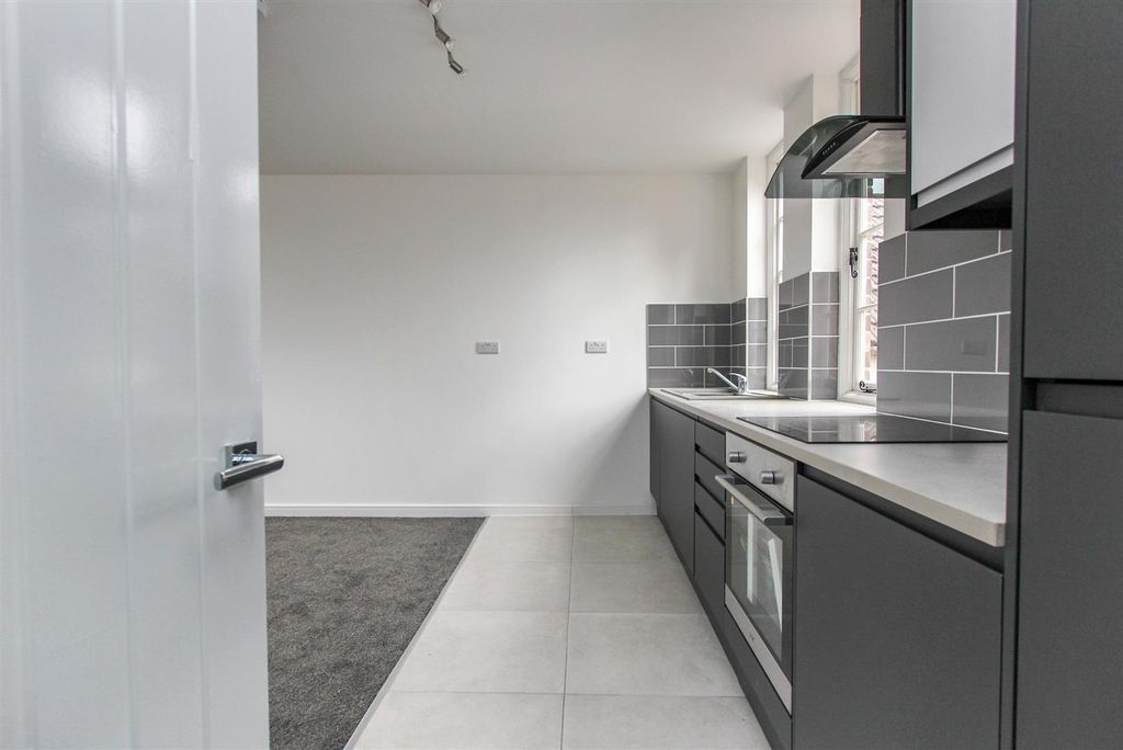 Property photo 3 of 10 Kitchen/Dining/Living Room