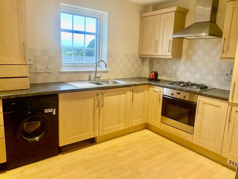 Property photo 3 of 8 Kitchen
