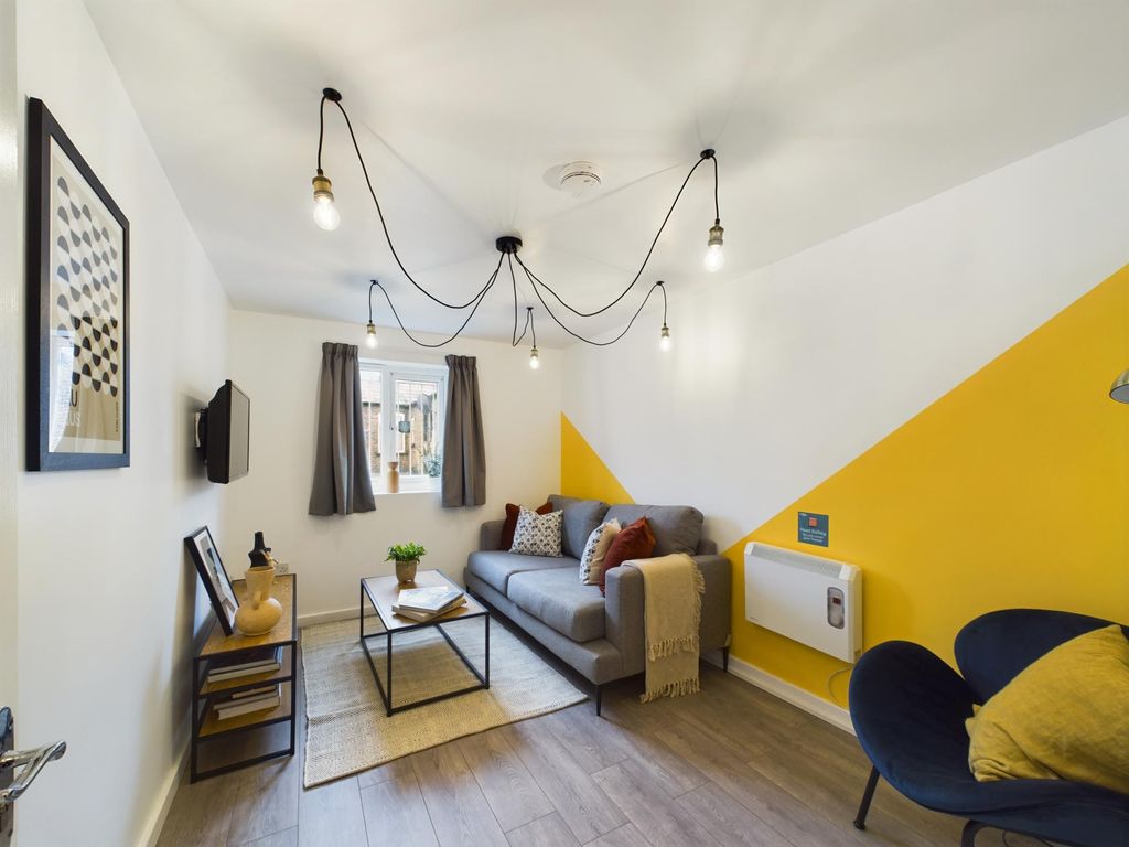 Property photo 2 of 11 Bright And Welcoming Modern Living Room Featuring ...