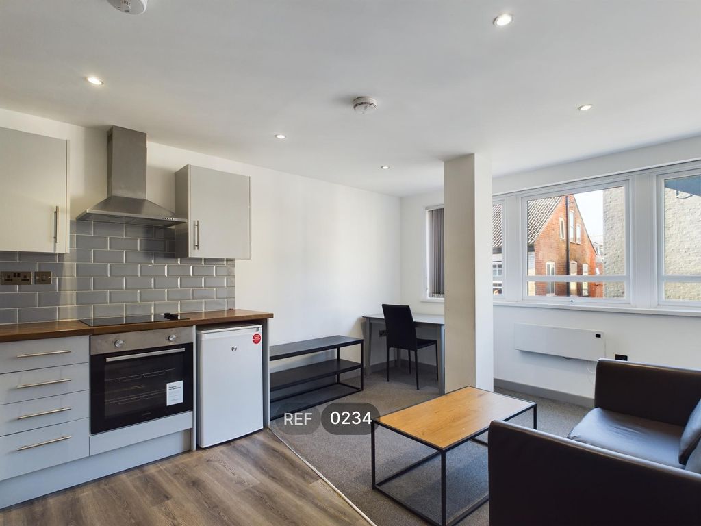 Property photo 3 of 8 Kitchen &amp; Living Area