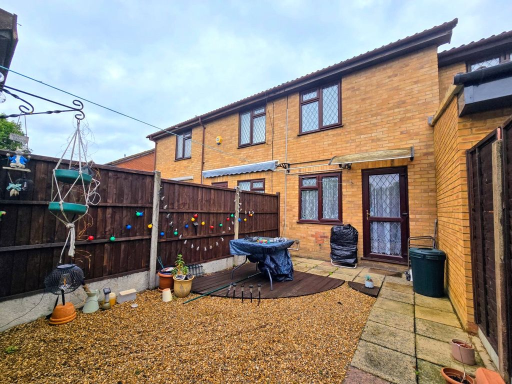 Property photo 2 of 9 Garden/Rear View