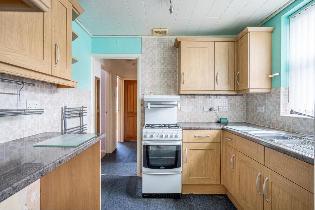 Property photo 3 of 12 Kitchen