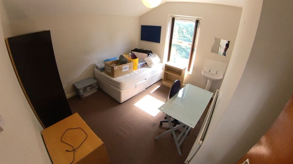 Property photo 2 of 13 A Bright And Modern Living Room With Ample Natural...