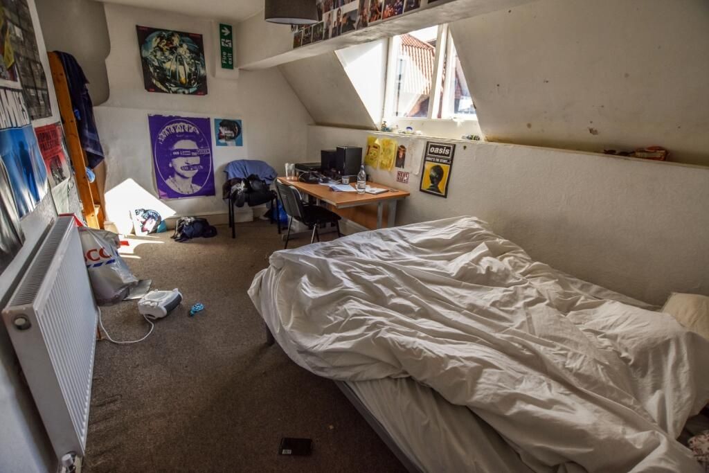 Property photo 1 of 4 Cozy Single Bedroom With A Slanted Ceiling And Two...