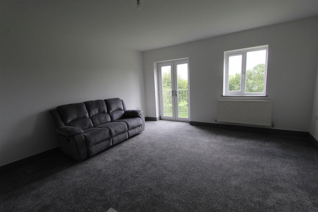 Property photo 3 of 8 Living Area