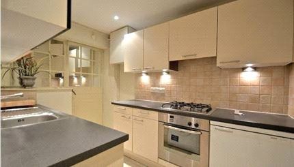 Property photo 3 of 7 Kitchen