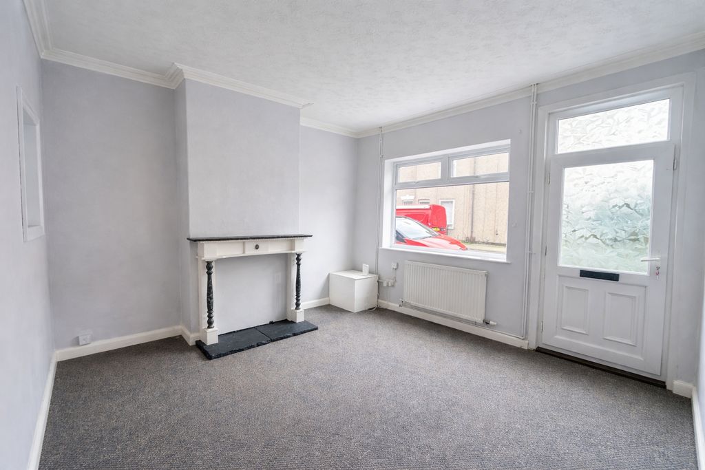 Property photo 2 of 8 Living Room 1