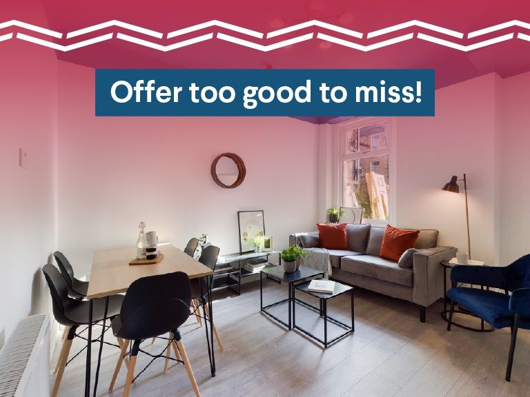 Property photo 3 of 8 Bright And Inviting Living Room Featuring Modern F...