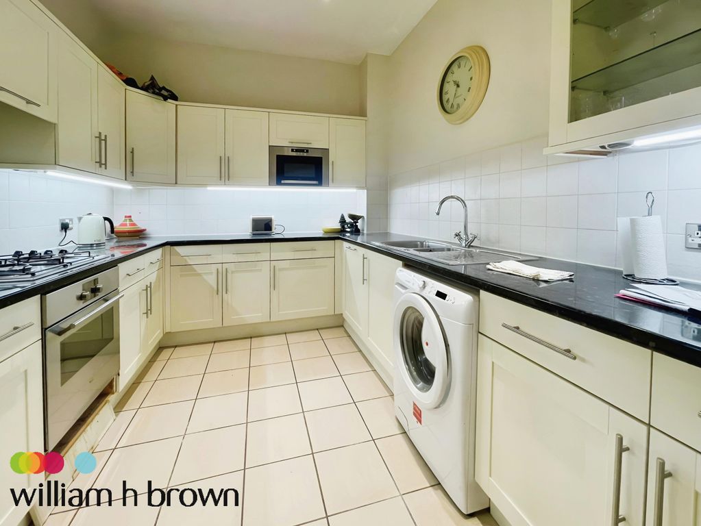 Property photo 2 of 12 Kitchen