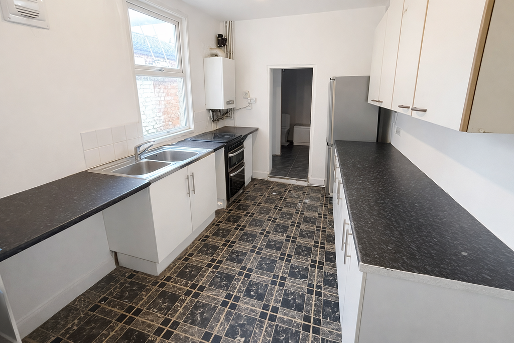 Property photo 3 of 8 Kitchen