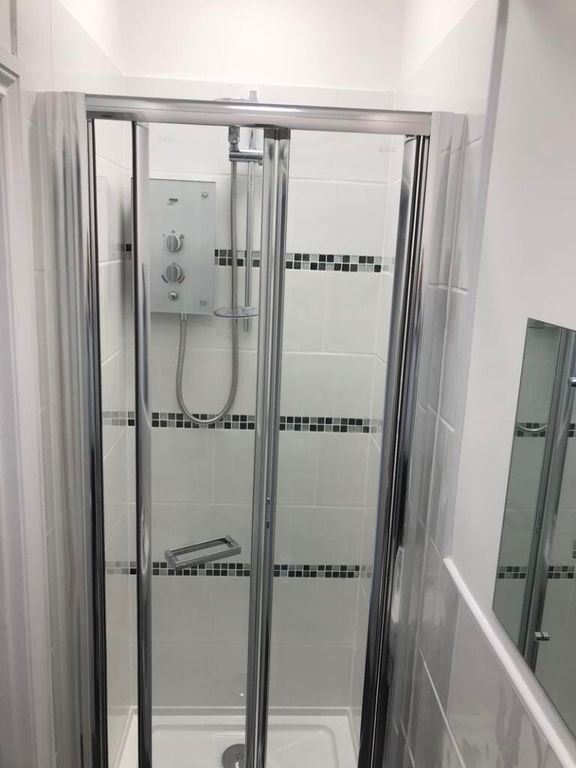 Property photo 1 of 6 A Modern, Clean Bathroom Featuring A Spacious Show...