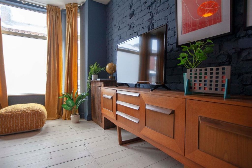 Property photo 2 of 15 Stylish Lounge With Exposed Brick And Natural Ligh...