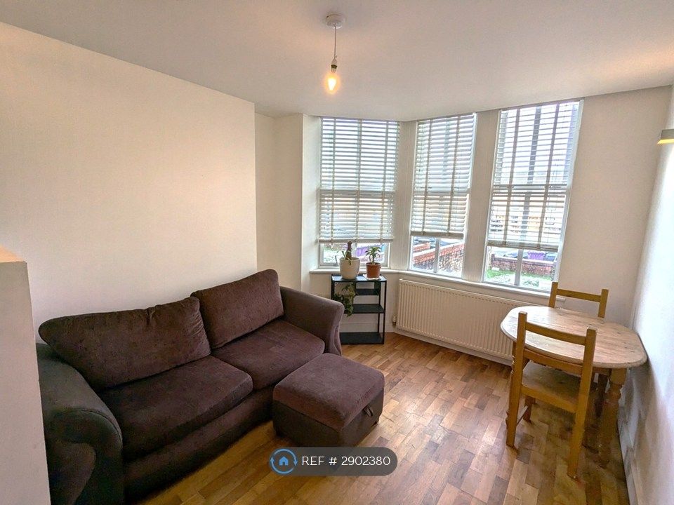 Property photo 3 of 11 Bright Living Area