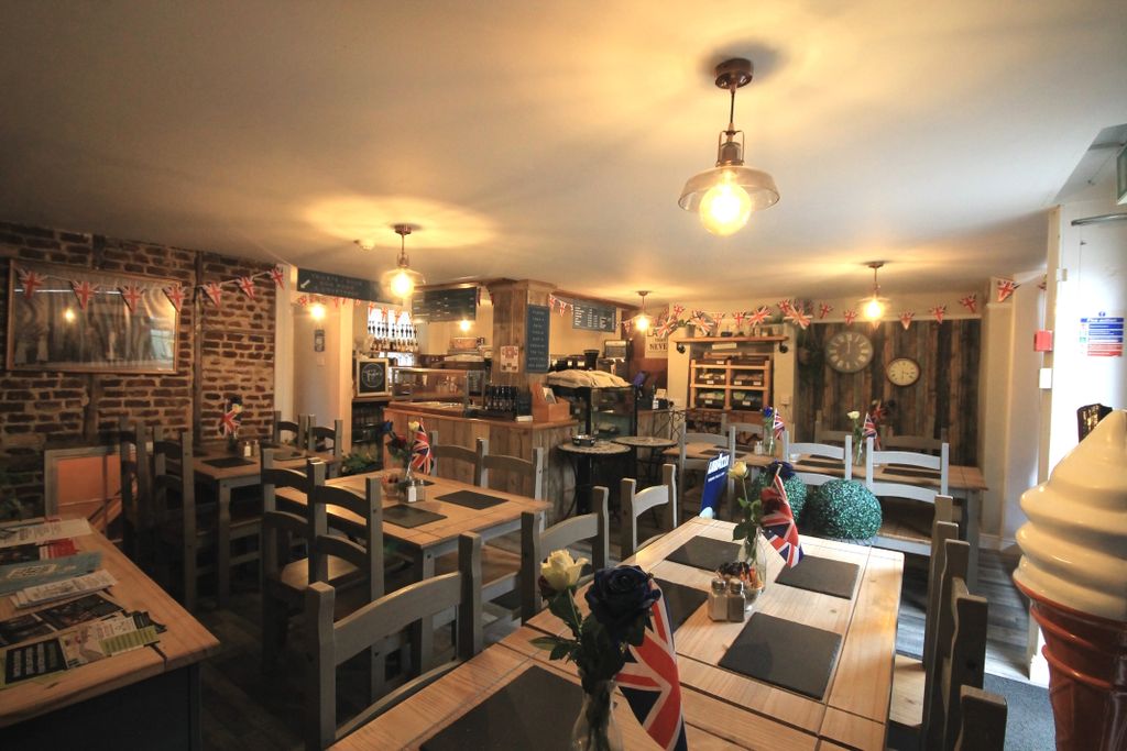 Property photo 2 of 16 Taylor's Main Seating Area