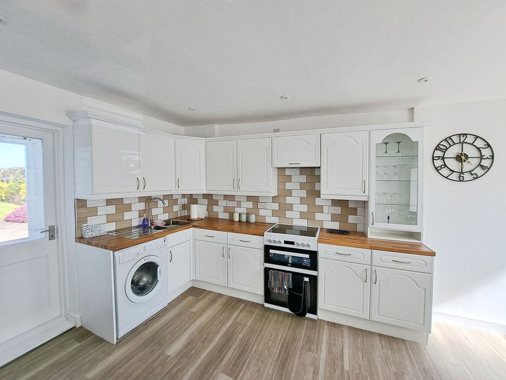 Property photo 2 of 13 Kitchen Area