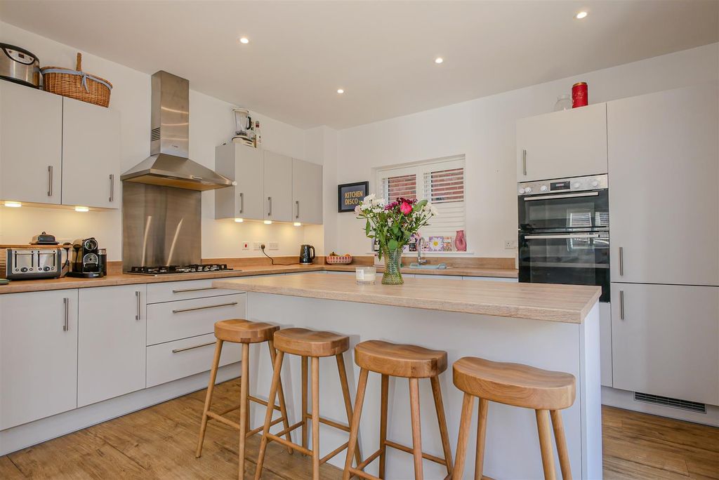 Property photo 3 of 17 Kitchen/Dining/Family Room