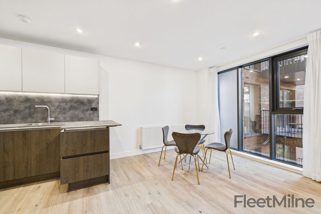 Property photo 1 of 10 Living Area