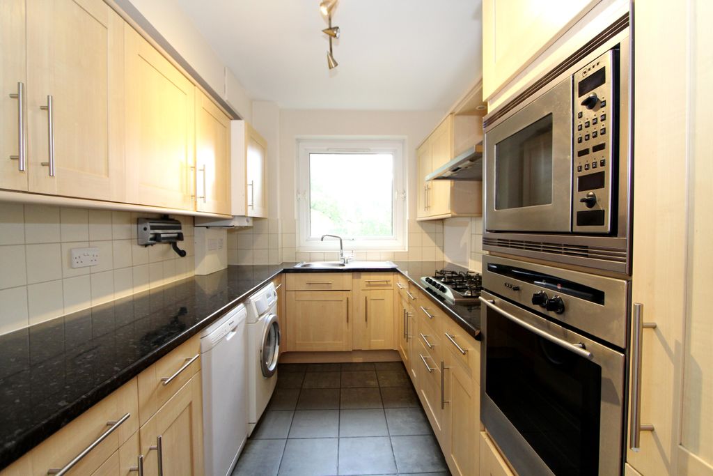 Property photo 3 of 8 Kitchen