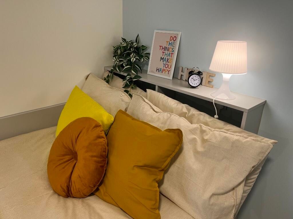 Property photo 2 of 14 A Cozy Master Bedroom Featuring A Comfortable Bed ...