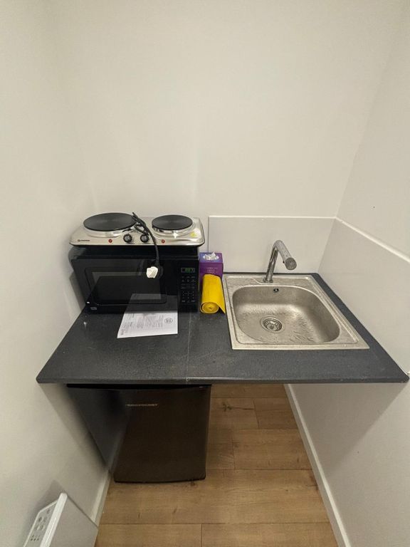 Property photo 3 of 4 Efficient Kitchenette With Modern Appliances...