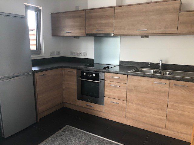 Property photo 3 of 12 Kitchen Area