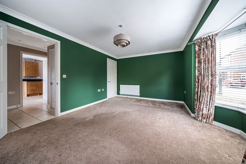 Property photo 3 of 11 Living Area