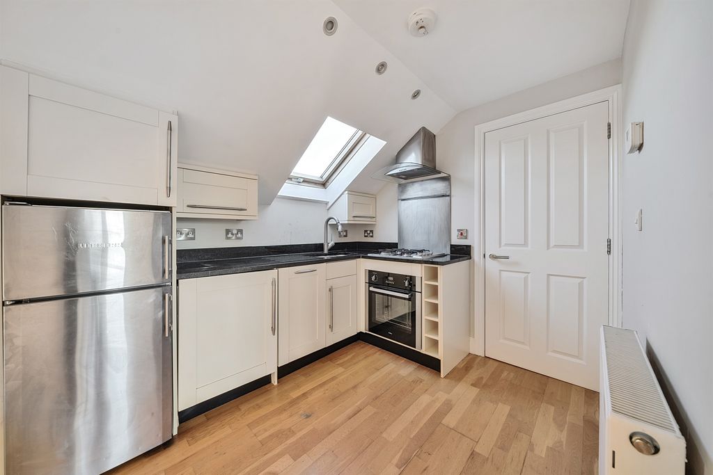 Property photo 3 of 7 Kitchen