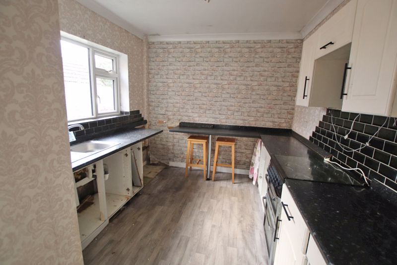 Property photo 3 of 13 Kitchen