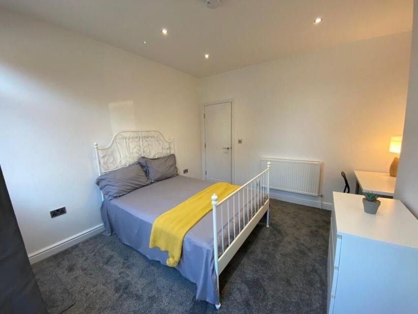 Property photo 1 of 15 A Bright And Welcoming Master Bedroom Featuring A ...