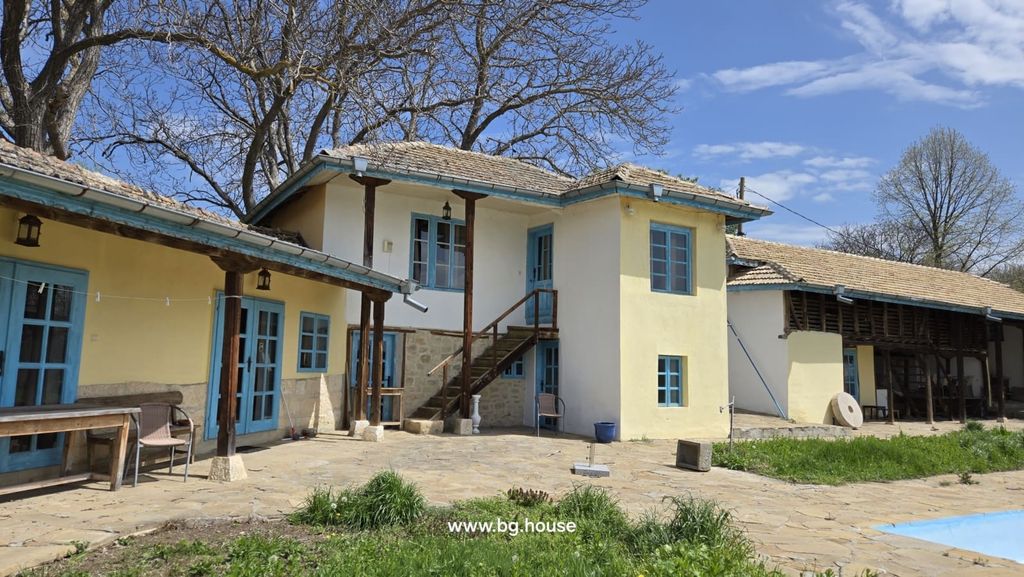 Property photo 1 of 99 Traditional Bulgarian Rural House With Stone Roof And Blue Window Frames Surrounded By Trees