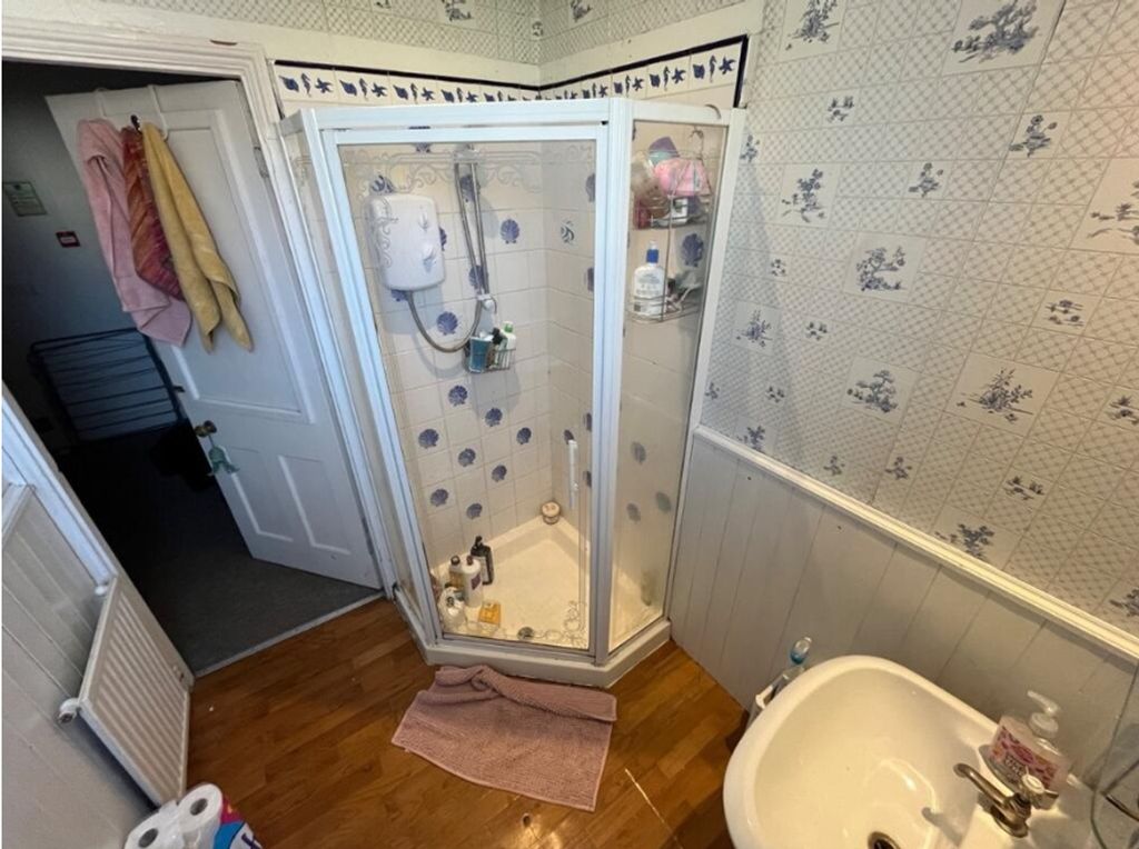 Property photo 2 of 13 A Tidy Bathroom Featuring A Shower And Stylish Dec...