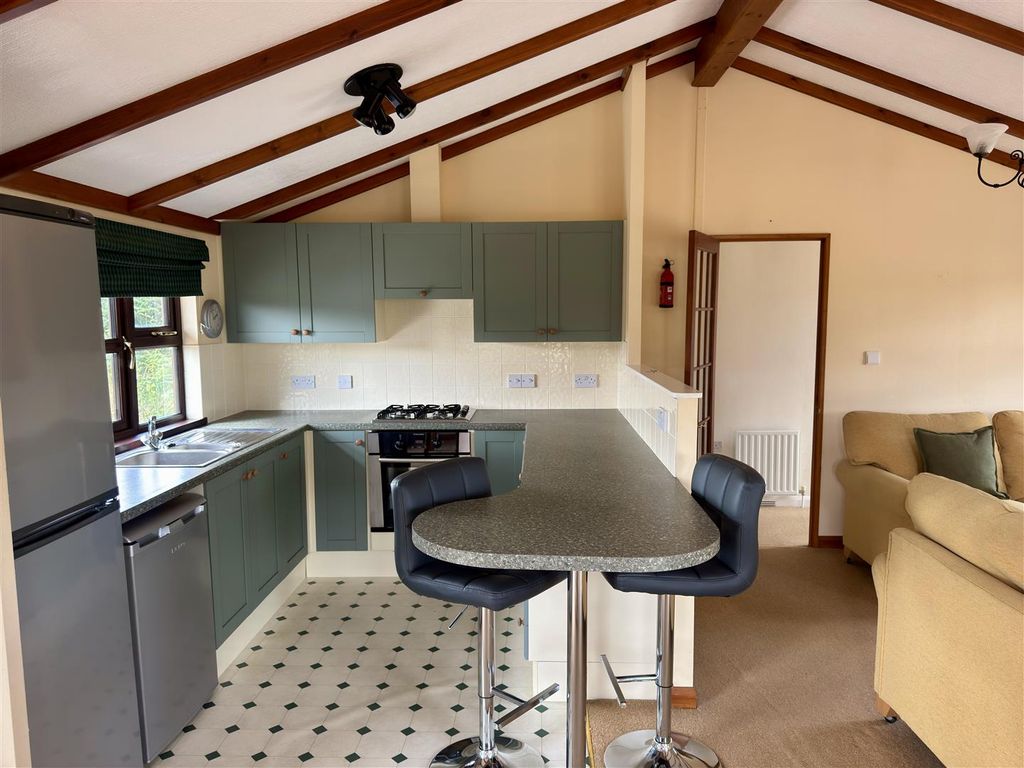 Property photo 2 of 9 Kitchen