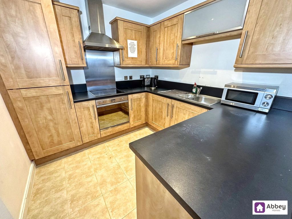 Property photo 2 of 9 Kitchen Area