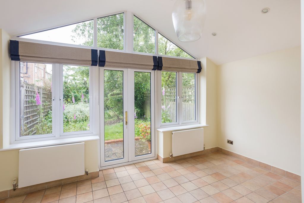Property photo 3 of 12 Conservatory